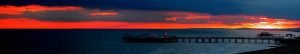 Sunset over the sea showing Brighton and The West pier (CANVAS) by unkown